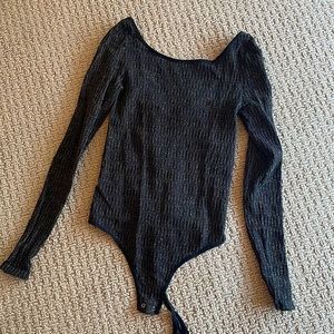 Black and gold shimmer body suit